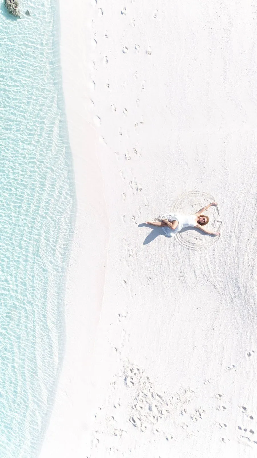 Aerial view of a white-sand beach in South Ari Atoll, Maldives