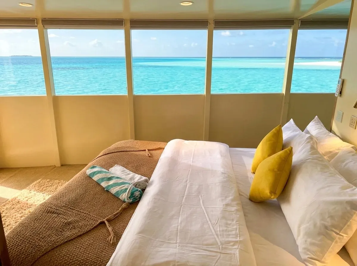 Upper deck ocean view room on the Atoll Villa yacht
