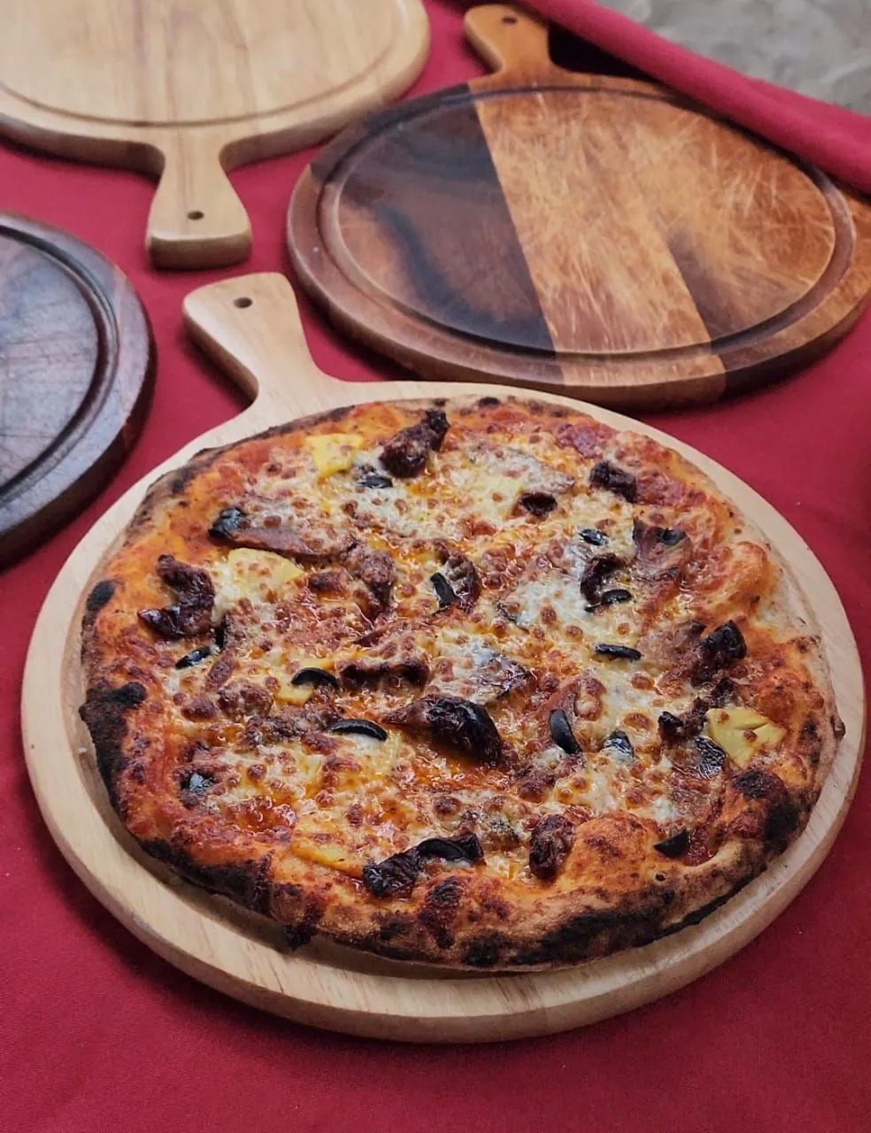 Stone-baked pizza from Shaka Slice by Luau