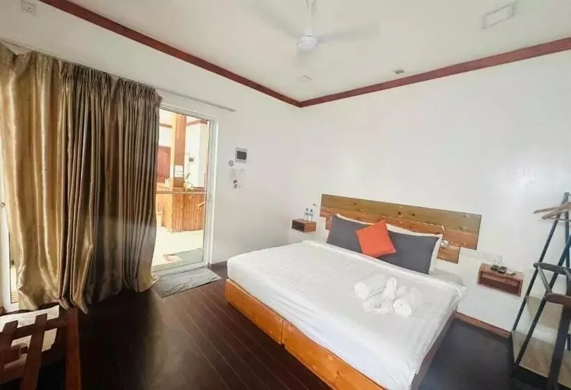 Deluxe room with terrace door at Seasun Beach, Maafushi