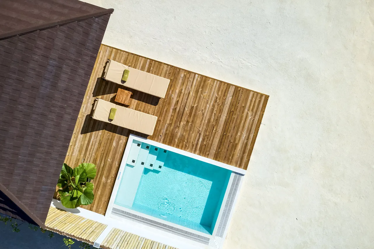 Beach villas aerial at Romance Island, the adults-only island of Sun Siyam Olhuveli, Maldives