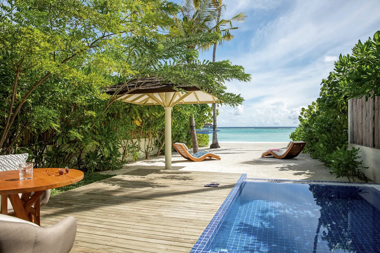 Romantic beach villa pool at Romance Island, the adults-only island of Sun Siyam Olhuveli, Maldives
