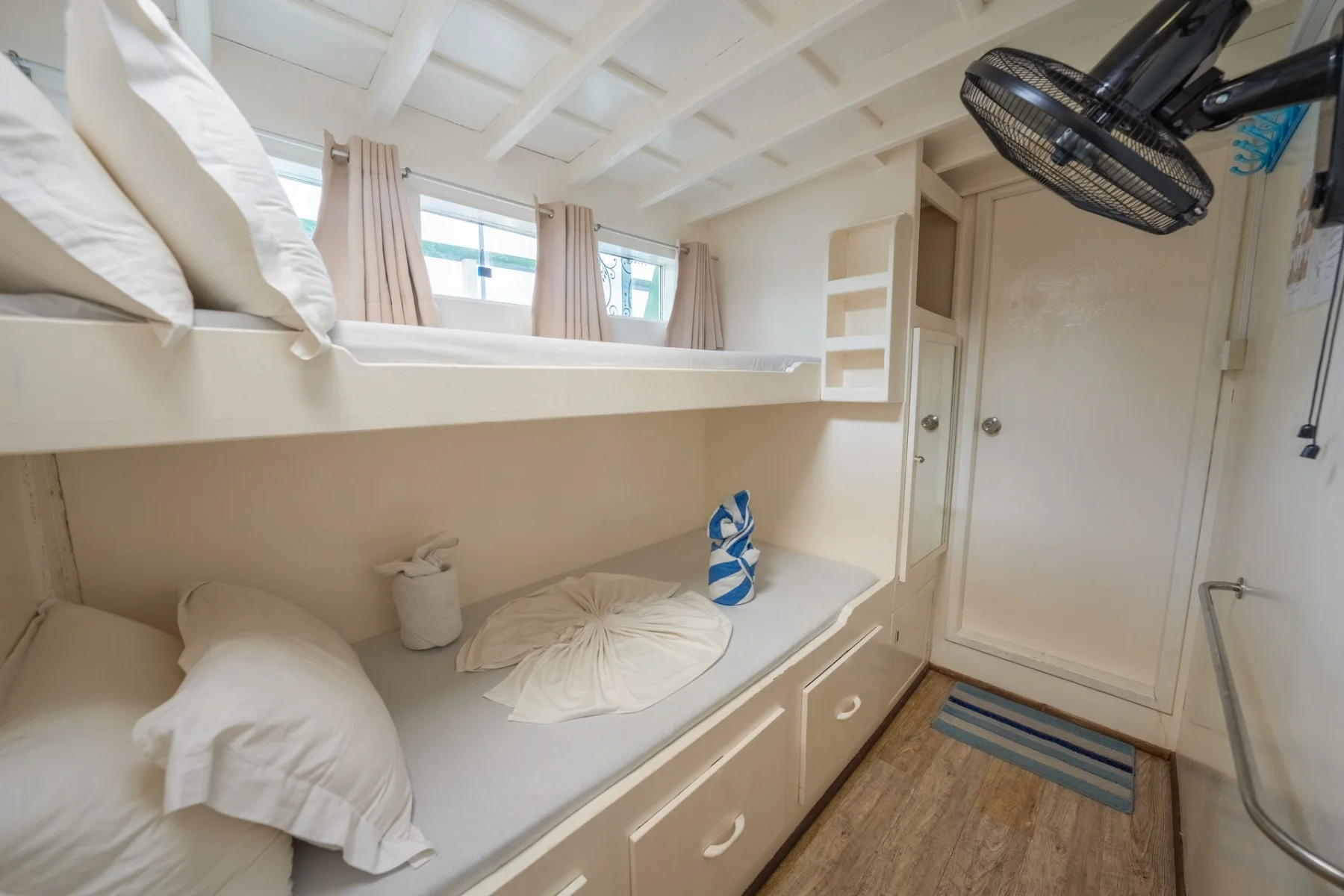 Guest cabin aboard Gahaa, a small-group Maldives safari boat