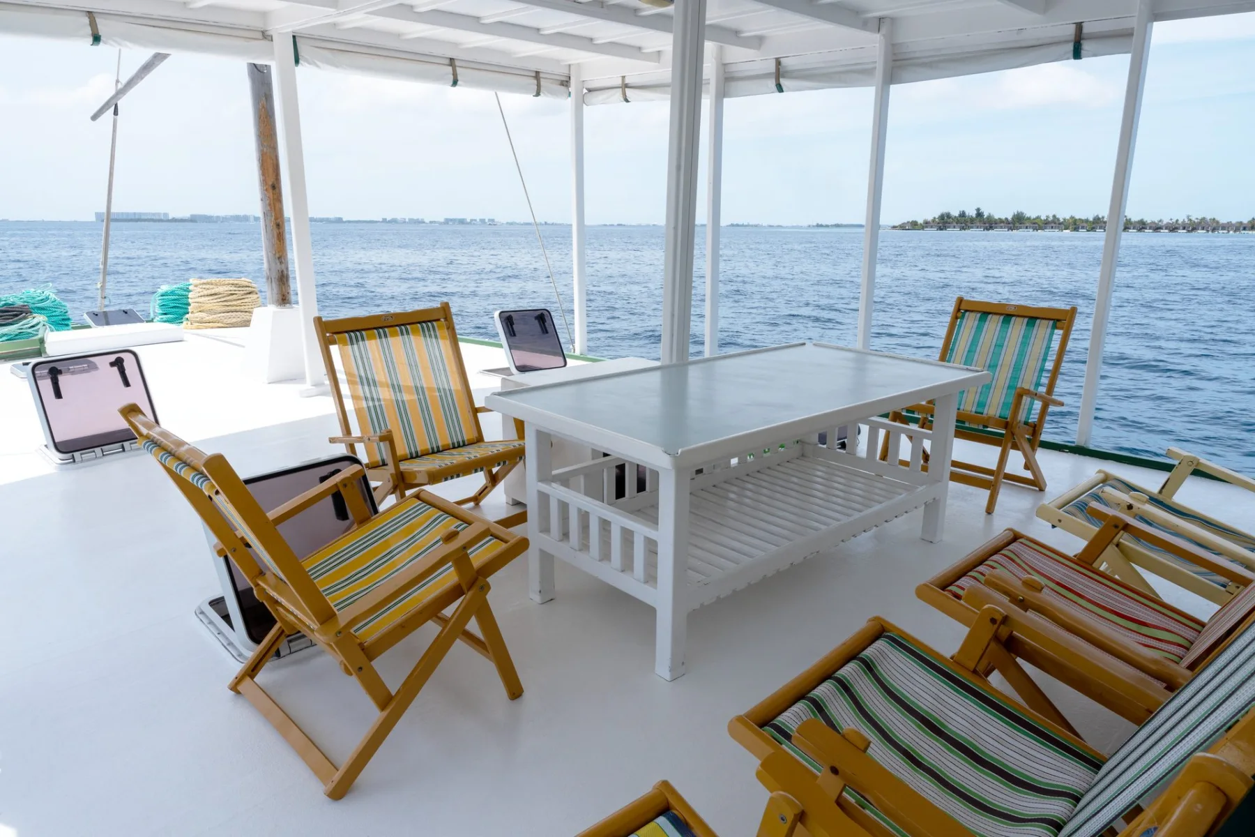 Covered top-deck lounge aboard Gahaa Maldives liveaboard safari boat