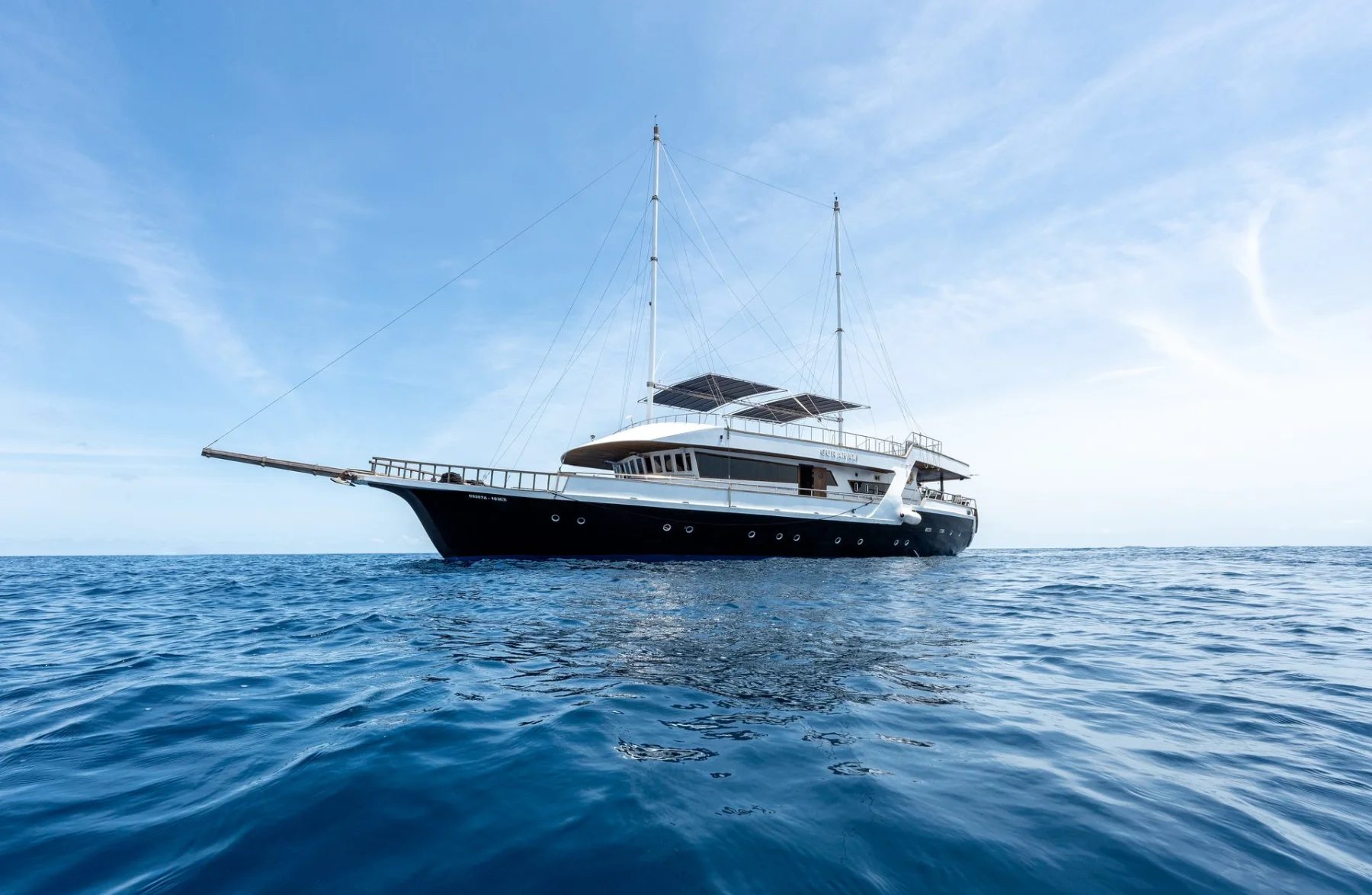 Gurahali traditional timber safari boat shown in full at sea in the Maldives