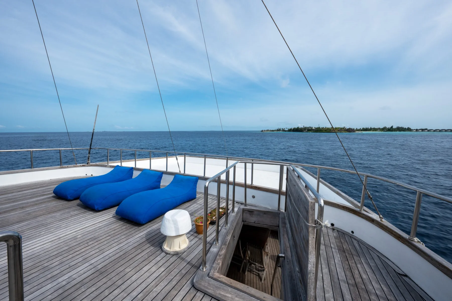 Open-air deck aboard Gurahali overlooking the Maldives ocean
