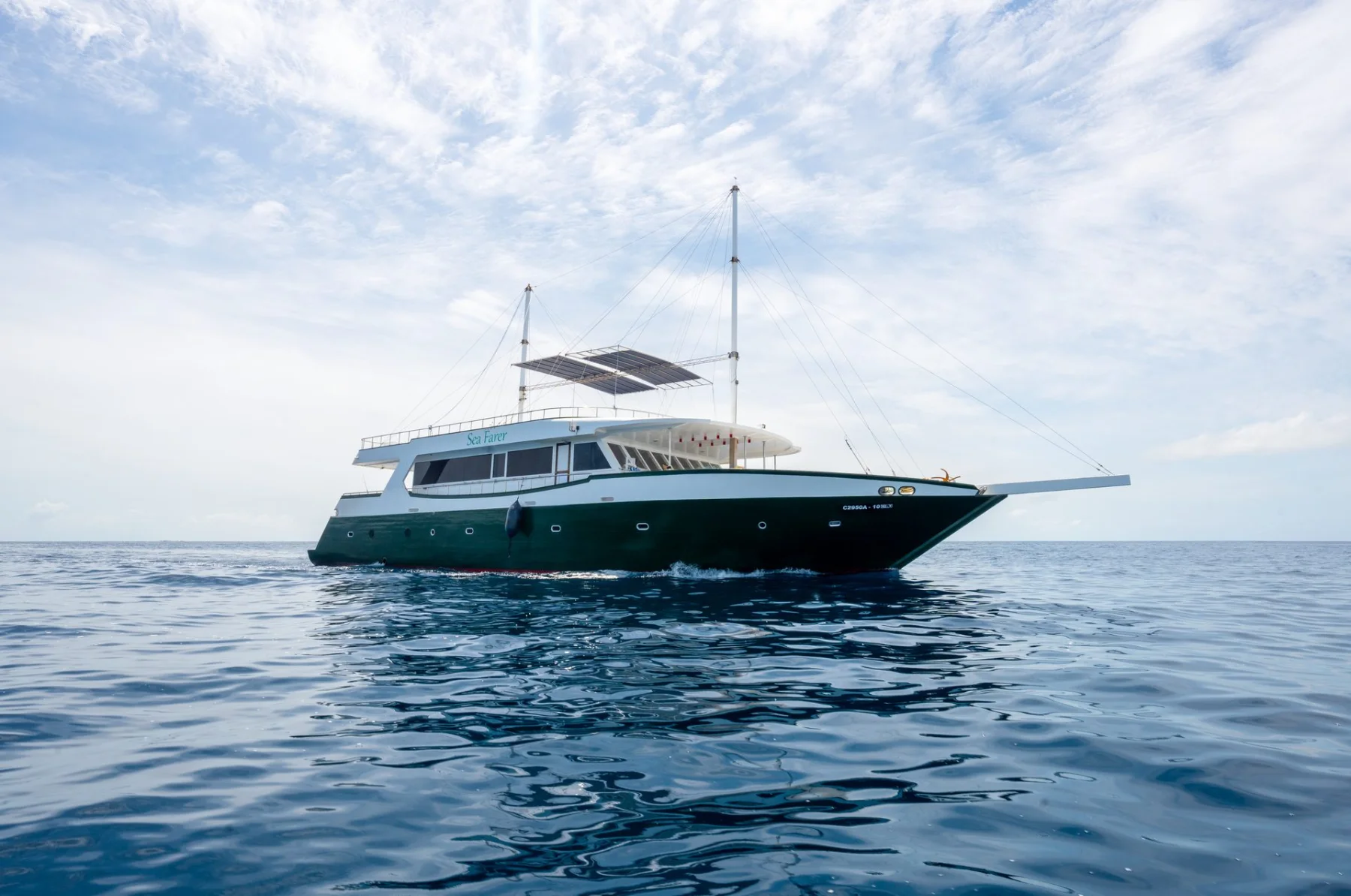 Sea Farer traditional Maldives safari boat shown in full on the open sea